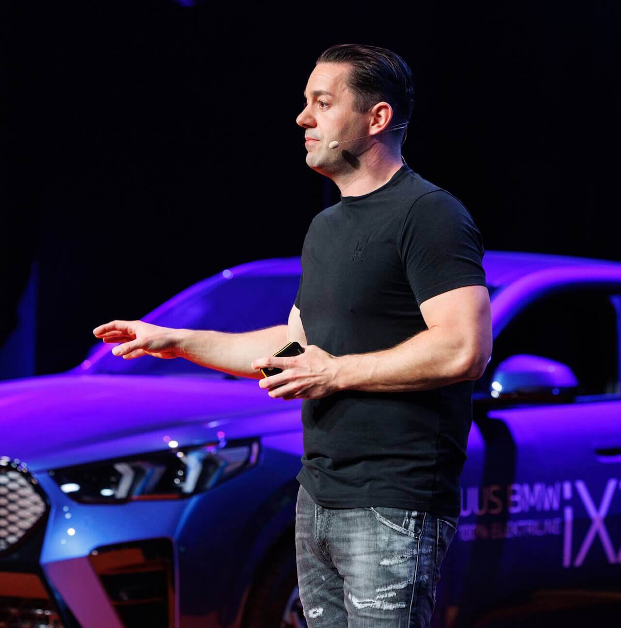 Bastian Grimm speaking on stage